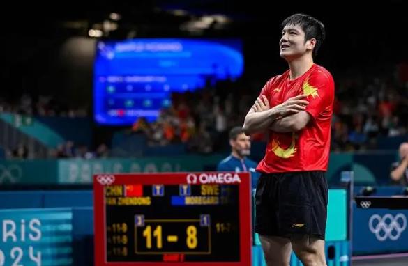 包含中国乒乓球队力克德国乒乓球队，樊振东高光表现的词条